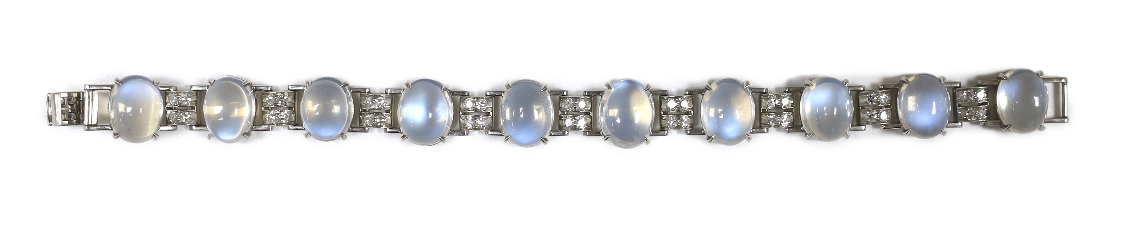 An early to mid 20th century platinum, moonstone and diamond cluster bracelet